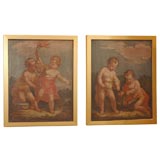 Pair of oils on panel, paintings of putti
