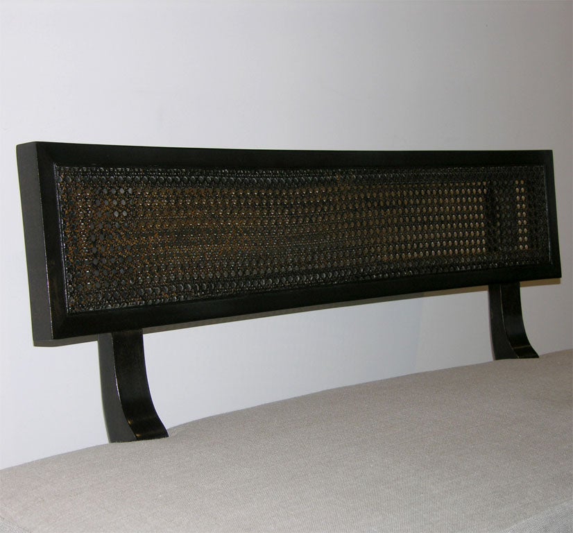 A Curved Upholstered Bench. 1