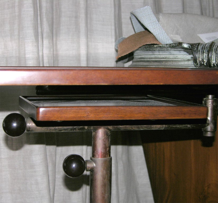 Swivel top reading table. 5