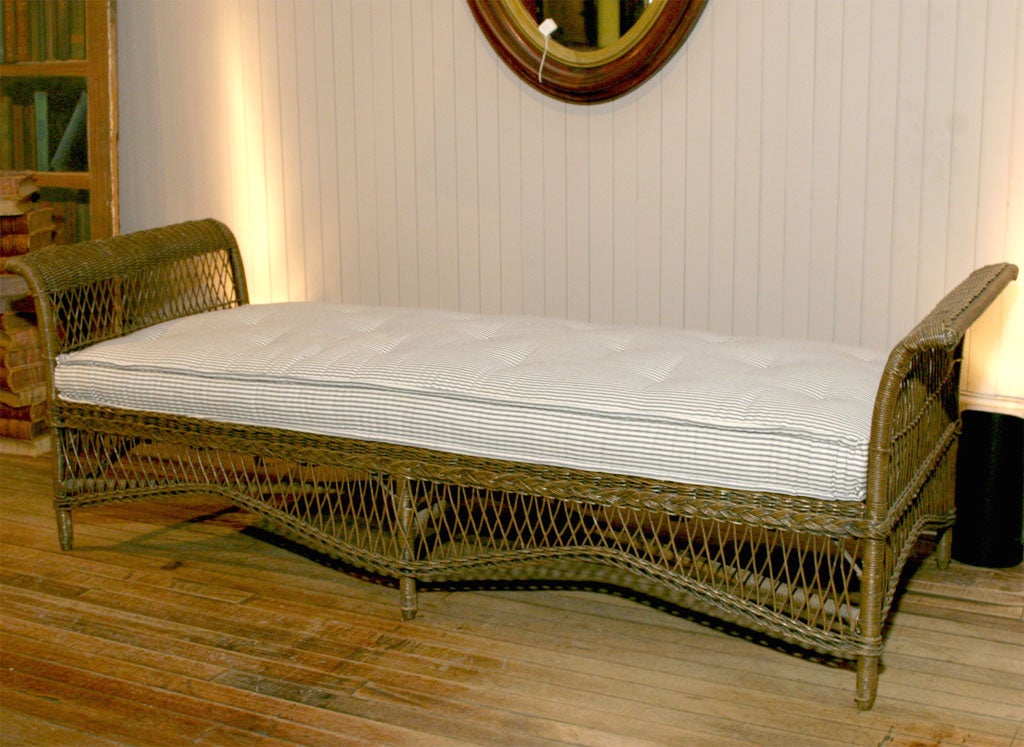 woven wicker style day bed or window seat<br />
brown stained patina<br />
new hand made mattress in ticking