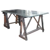 A great desk with a zinc top and old trestle base