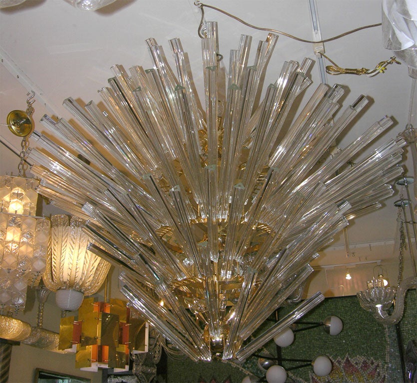 Large scale brass and glass prism chandelier