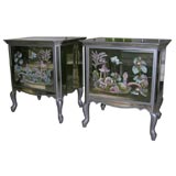 Pair of reverse painted smoked mirror commodes