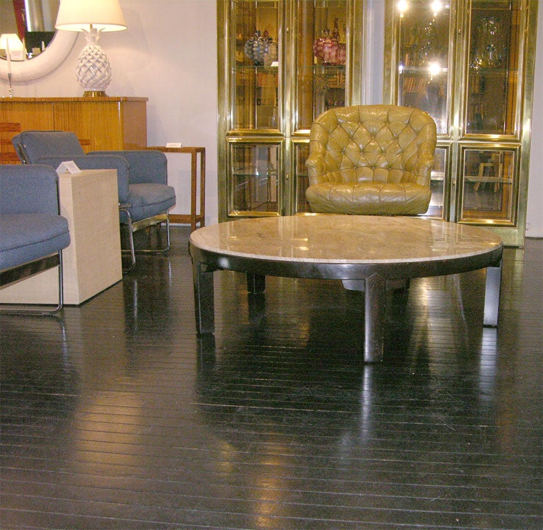 Coffee table No. 5219 with base in mahogany and top in Portuguese travertine designed by Edward Wormley for Dunbar, American 1952 (original Dunbar label on bottom)