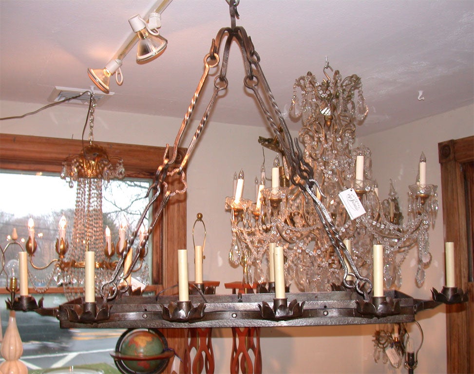 Rectangular 10 candle iron work chandelier with detailed undercarriage