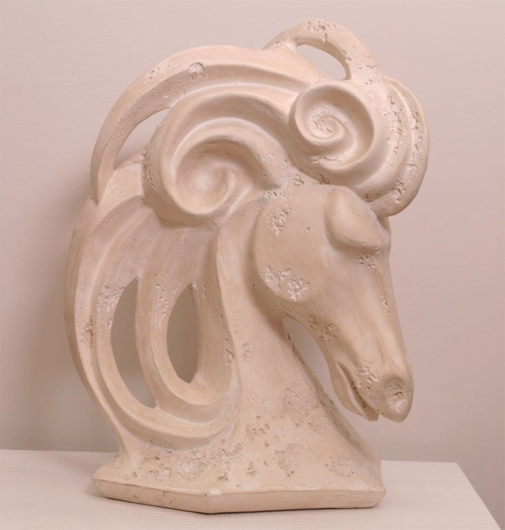 This over-sized, faux-travertine plaster horse head is a 70's interpretation of 40's glamour...for 21st century style and fun!