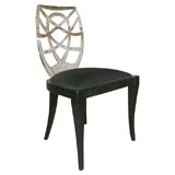 Set of four chairs with lucite backs