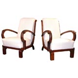 Pair of 20th Century mahogany open arm chairs