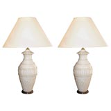 Pair of carved alabaster vase shaped lamps