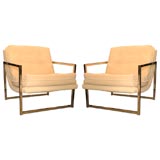 Chrome pair of tufted armchairs by Milo Baughman