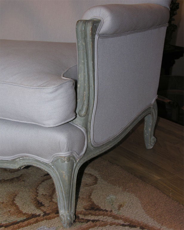 Mid-20th Century Louis XV style serpentine shaped back sofa.