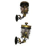 Pair of Italian tole and iron wall mounted lanterns