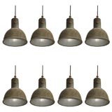 Set of 8 patinated French industrial lights