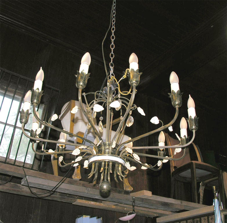 Lord and Taylor store fixture. Twelve-arm brass chandelier with enameled leaves.