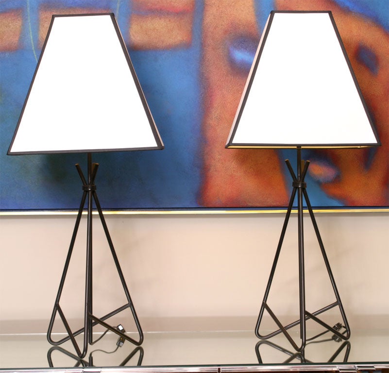 SOLD MAY 2010In the style of Haines, these new hairpin shaped black patinated iron table lamps are ready for your shades.  Fabulous how the three iron bars come together near the top.  Very elegant, clean, simple lines. Reduced from $1200/pair.<br