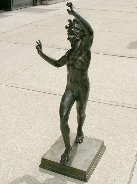 A GRAND TOUR BRONZE FIGURE OF THE  "DANCING FAUN OF POMPEII"