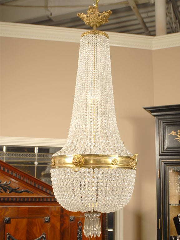 19th Century French Fine Quality Crystal and Bronze Dore Chandelier with Lion's heads ornamentation