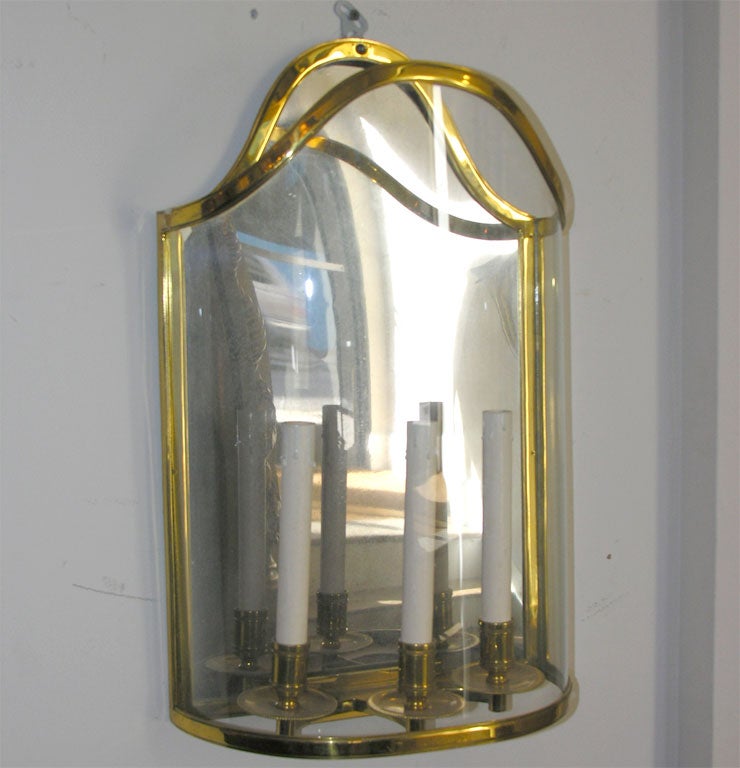 A pair of French Empire style wall mounted lanterns