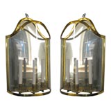 A pair of French Empire style wall mounted lanterns