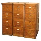 A Set of Three Filing Cabinets