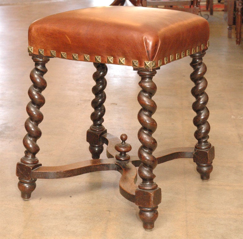 Louis XIII style leather top  with stretchers