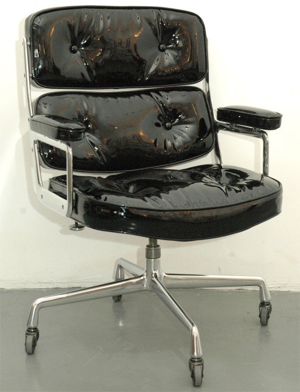 Time Life chair by Charles and Ray Eames reupholstered in sexy black patent leather.  Aluminum has been professionally polished.  Also available in white patent leather. PLEASE SPECIFY.