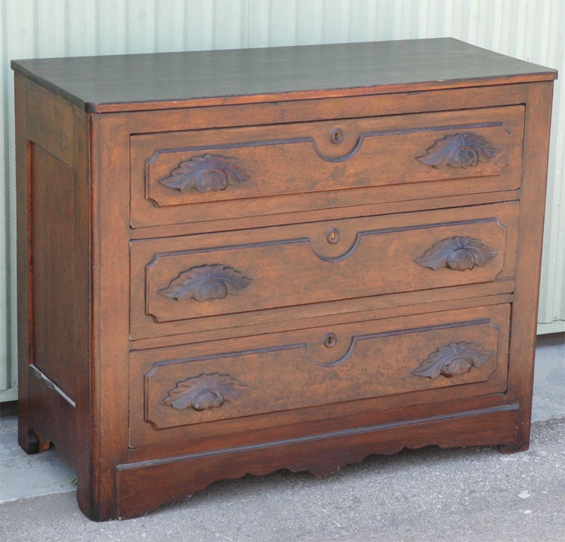19THC BEAUTIFUL WALNUT EASTLAKE/COTTAGE CHEST OF DRAWERS,WITH HAND CARVED DRAWER PULLS AND KEY HOLES.GREAT CUT OUTS TO THE SCALLOP SKIRT ON THE BASE OF THE CHEST.THE CHEST IS IN GREAT  CONDITION AND HAS A BEAUTIFUL PATINA.
