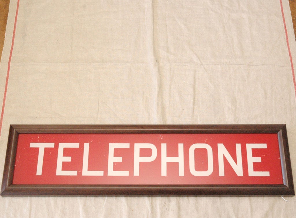 This old telephone sign is from the pre-cell phone era and of another world that you may remember from old movies. You will have seen this type glass sign set into the top a phone booth.