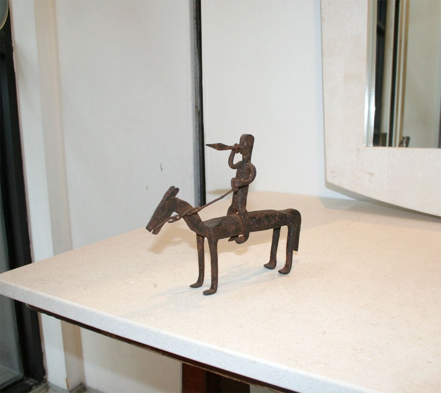 Bambara Tribe iron sculpture from Mali, West Africa, depicting a warrior with his spear riding a horse.