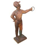 large cast iron lawn jockey