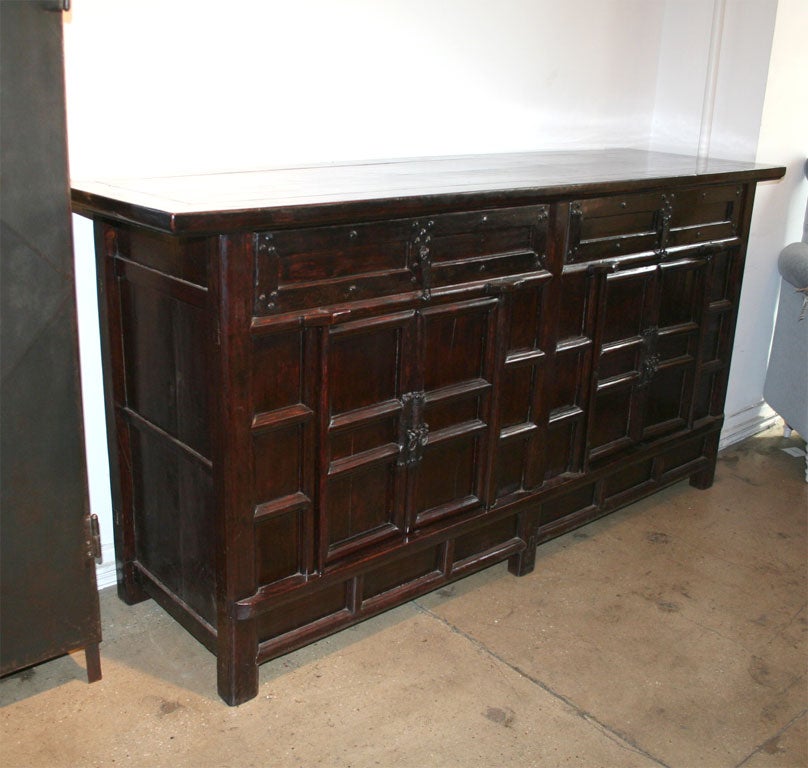 A large Chinese elm wood sideboard