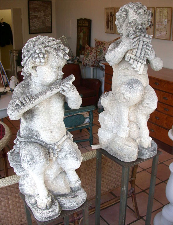 Carved PAIR OF PAN GARDEN STATUES