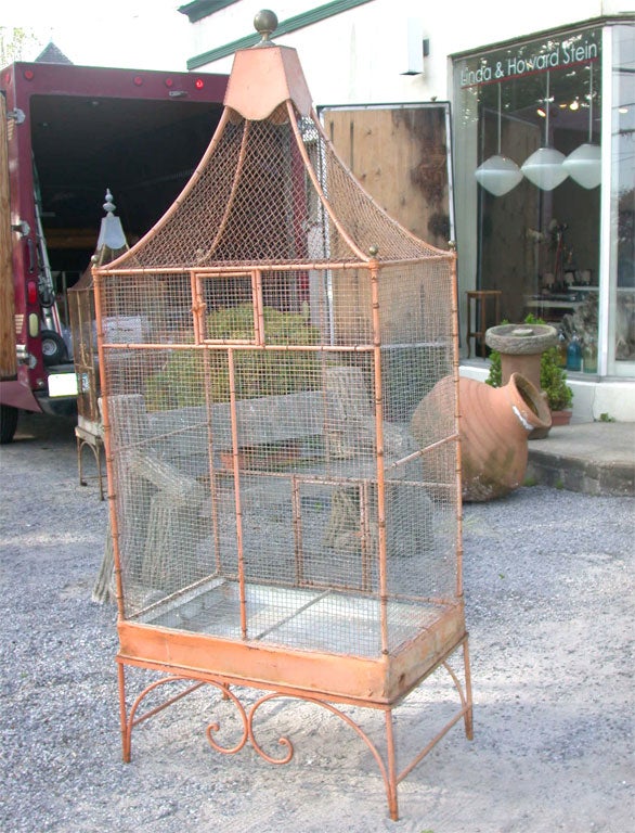 Painted metal birdcage. in two parts-cage and stand.