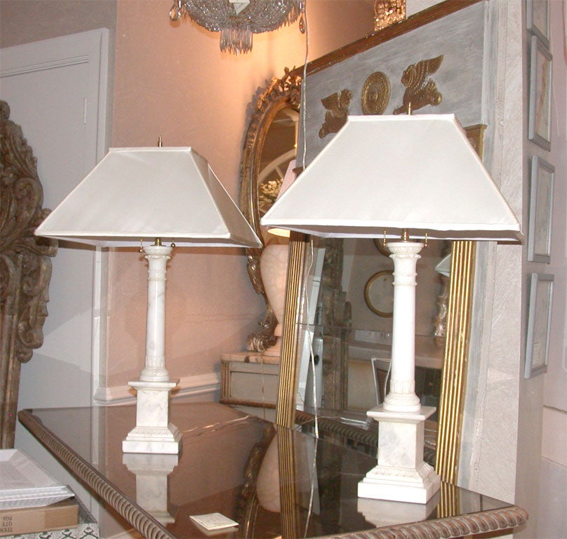 Attractive pair of white marble column lamps with custom silk shades