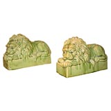 A pair of ceramic lions