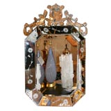 Mirror with etched floral design surround