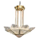 Art Deco molded glass and gilt bronze nine-light chandelier
