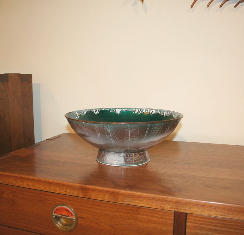 A fine and rare footed bowl with enameled decoration by one of America's foremost artisans.  Unusual large size and very early work.  Signed and dated 1936.