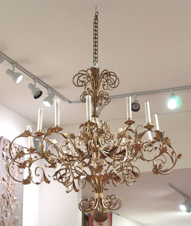 Pair of 12 light Gilt Iron Italian Chandeliers