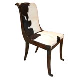 a set of 12 dining chairs attributed to Marcel Coard