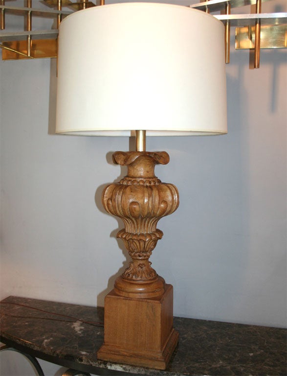 A pair of Art Moderne table lamps carved wood 1940's
New sockets and rewired
Shades not included