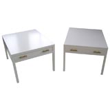 Pair of modern white lacquered end tables.