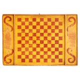 19THC ORIGINAL MUSTARD AND RED PAINTED GAME BOARD FROM N.E.