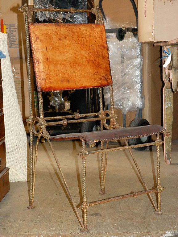 Four Waldo Fernandez Iron and Leather Chairs