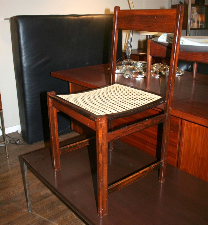 Set of six Brazilian rosewood and caned dining chairs, 1950s.