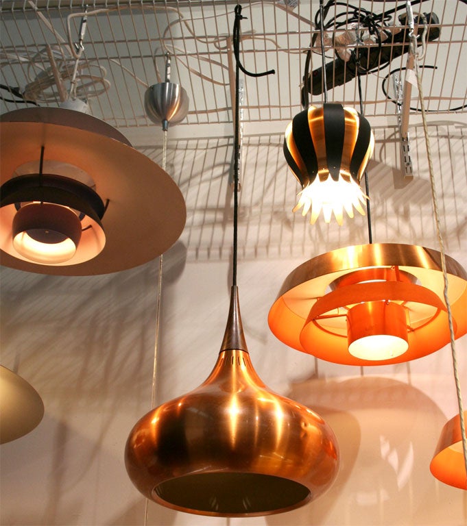 Copper and rosewood pendant lamp by Jo Hammerborg. The interior of the lamp is painted white.  <br />
<br />
There is 1 still available.