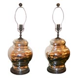 Pair of urn shaped mercury glass lamps