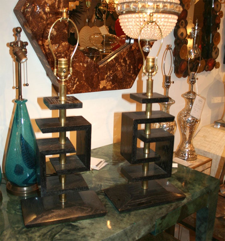 Pair of geometric wood lamps by James Mont
