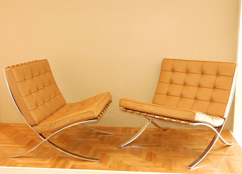 Great pair of Mies Barcelona chairs in original leather. Early Knoll Associates label. Great color. Classic.