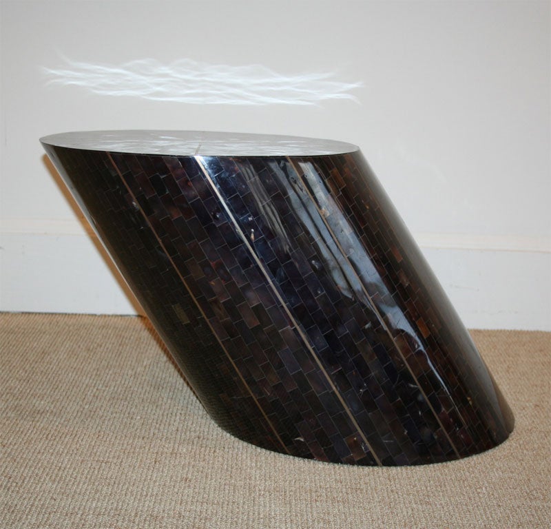 A Maitland Smith Round Slant Low Table.